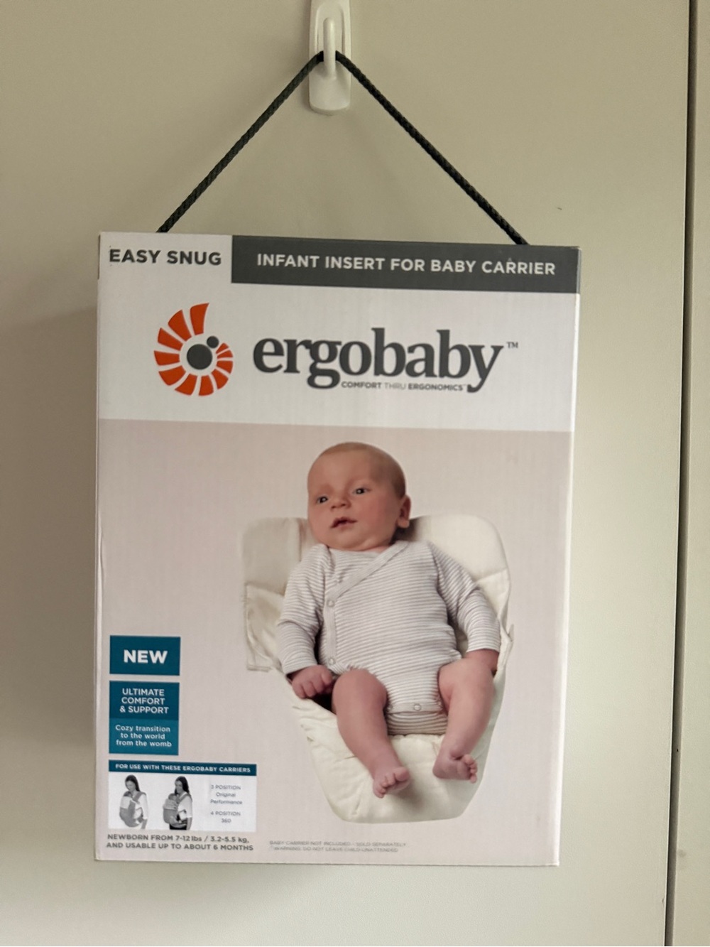New in Box Ergobaby carrier Insert, cream, MSRP $35